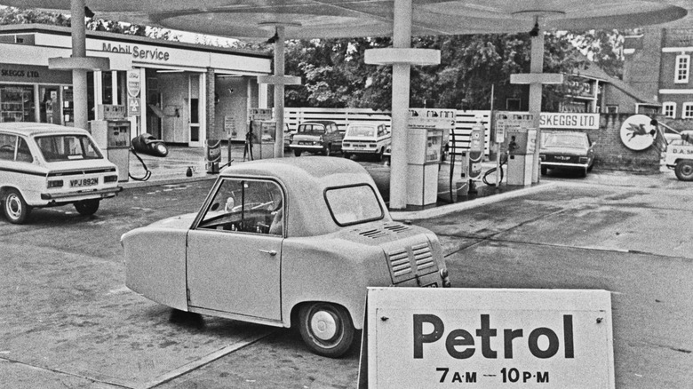 Petrol station and cars