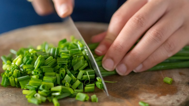 chopping scallions