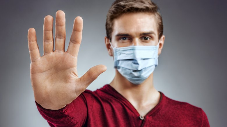 man wearing sick mask