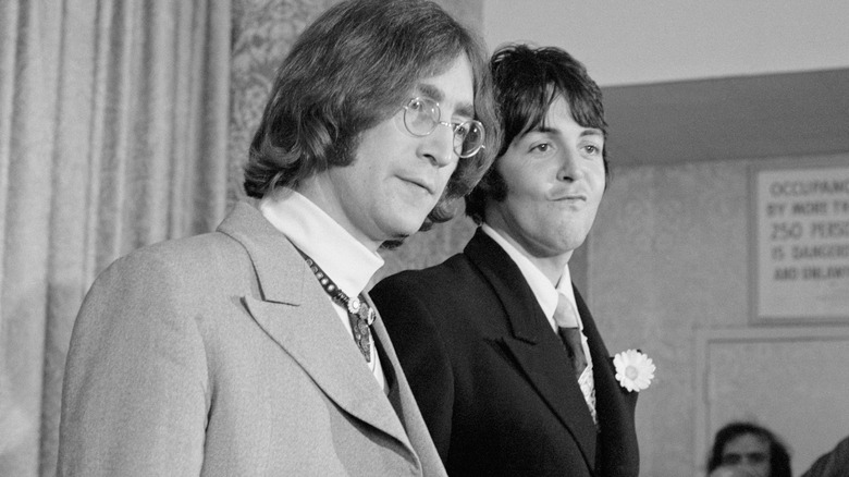 John Lennon and Paul McCartney standing together