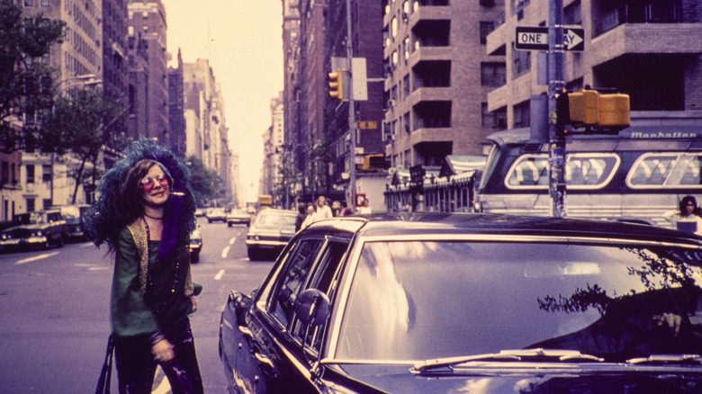 Janis Joplin walking in a New York City street
