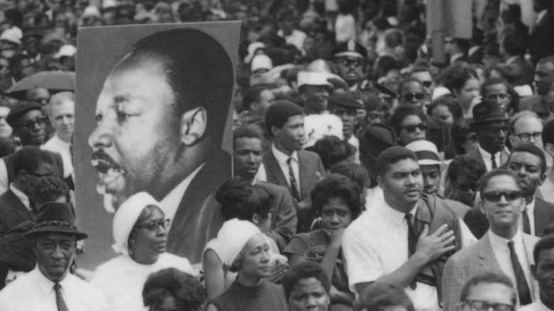 Portrait of Martin Luther King Jr. in crowd during April 9, 1968 funeral procession