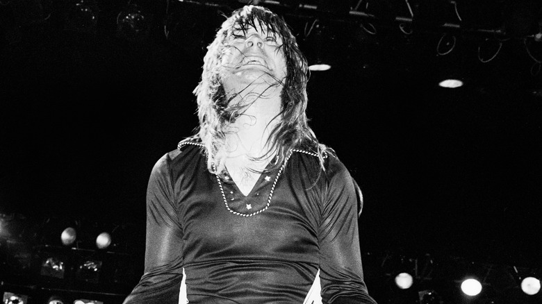 Ozzy Osbourne gesturing on stage in 1981