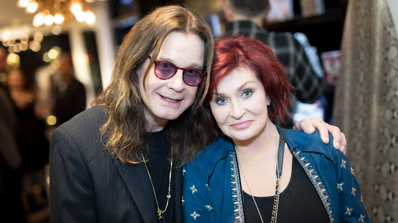 Ozzy Osbourne with his arm around Sharon in 2017