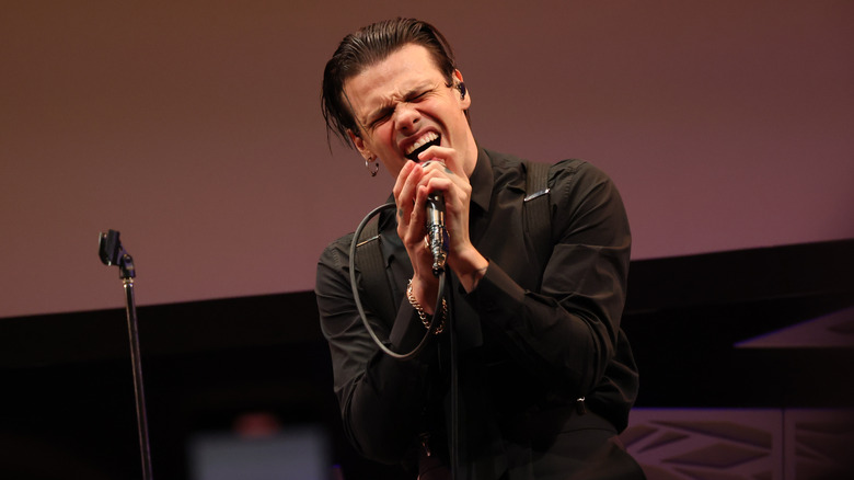 Yungblud singing on stage in 2025