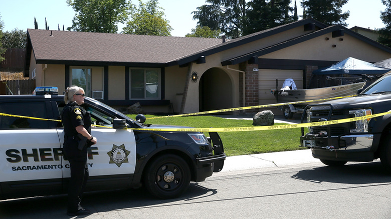 Police tape wraps DeAngelo's home