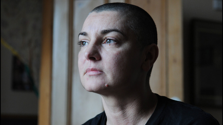 Sinead O'Connor posing for a portrait