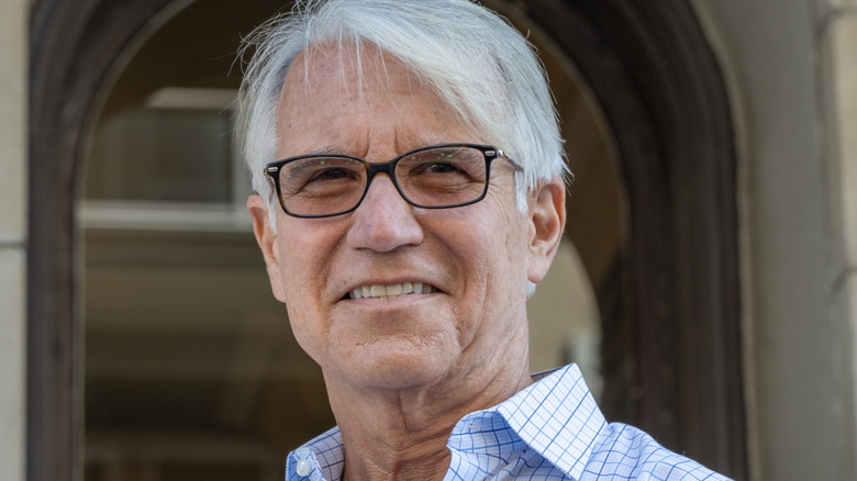 george gascon smiling in glasses outside courthouse