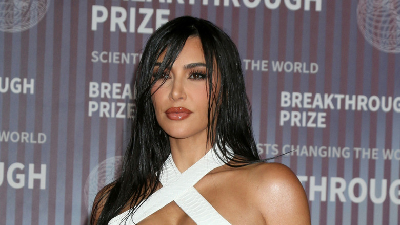 kim kardashian in white dress at event
