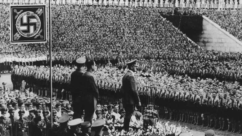HItler giving a speech to a massive crowd