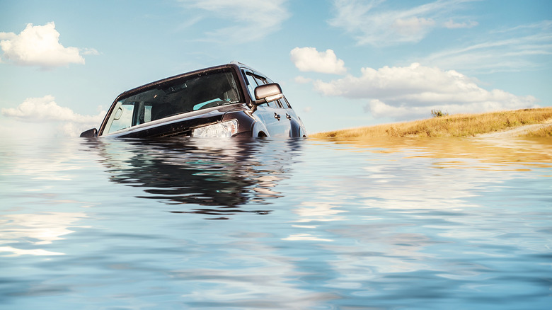 Car sinking in water