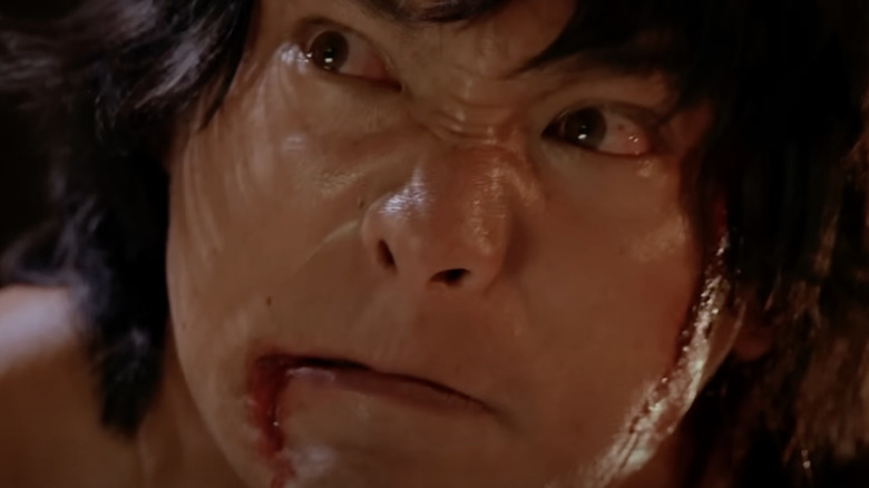 Jason Scott Lee scowling in Timecop 2