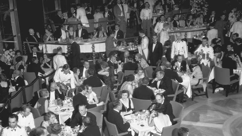 black tie crowd dining tables