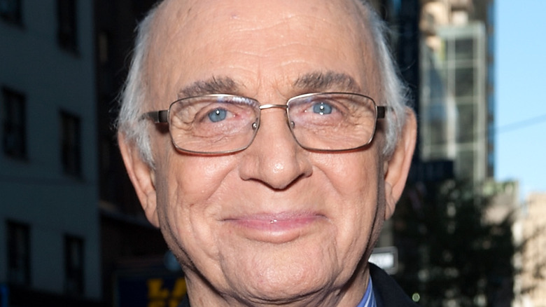 Gavin MacLeod in a suit