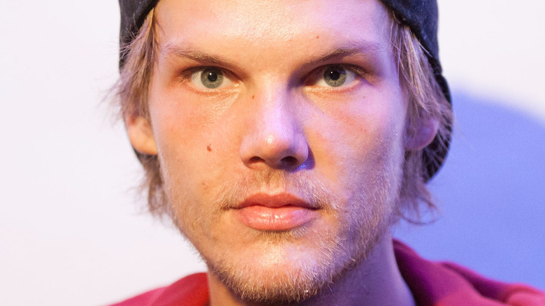 Avicii looking at camera