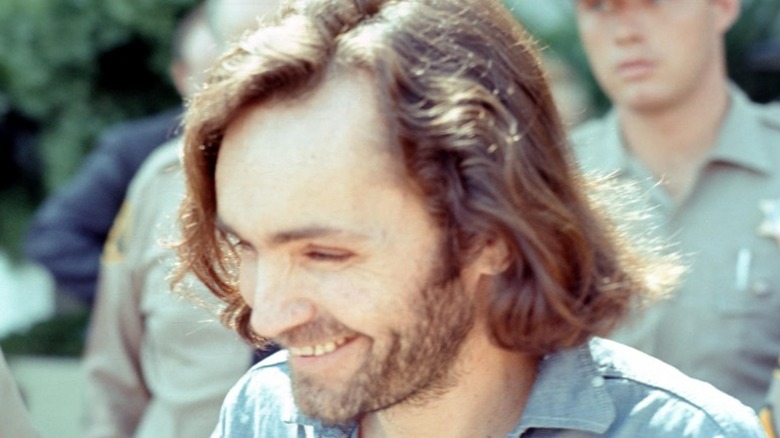 Charles Manson smiling