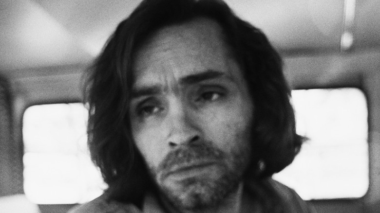 Charles Manson looking to side