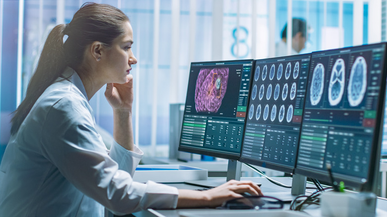 Doctor examining brain scans