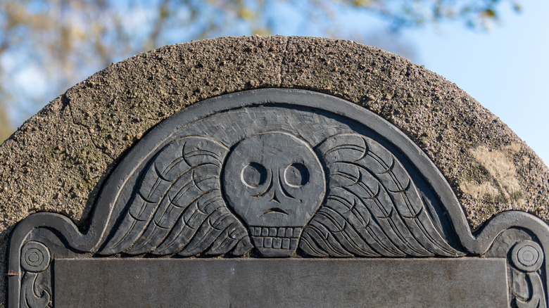 colonial headstone with death's head