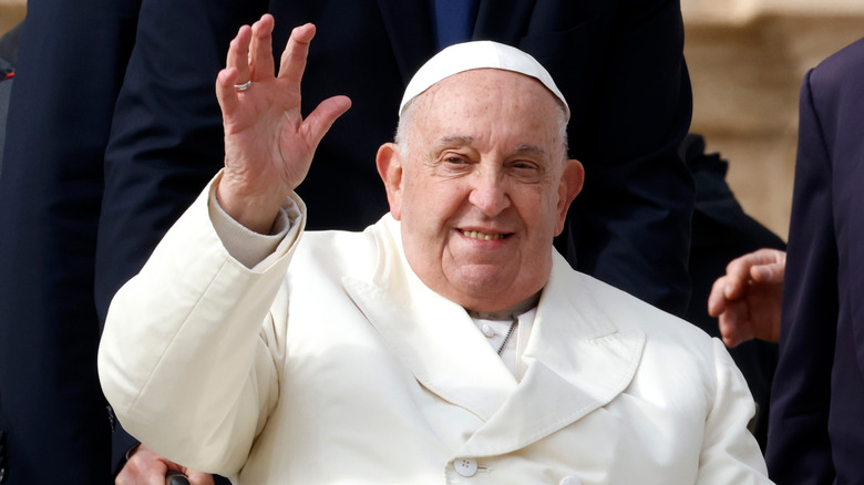 Pope Francis waving to public