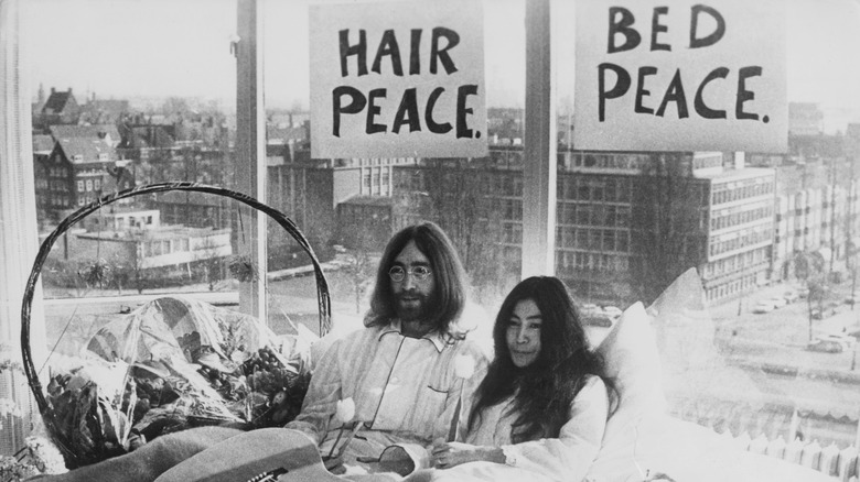 John Lennon and Yoko Ono in bed