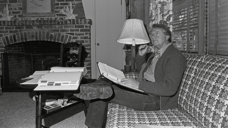 Jimmy Carter with pen and files