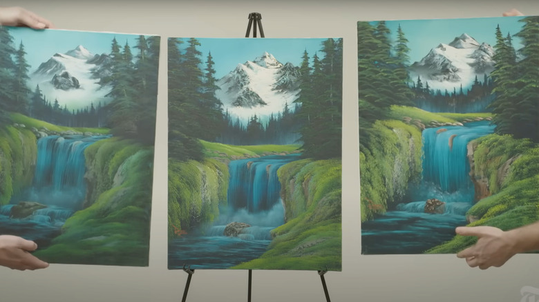 Three Bob Ross paintings are put alongside each other