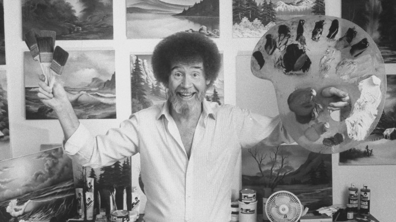 Bob Ross puts his hands up