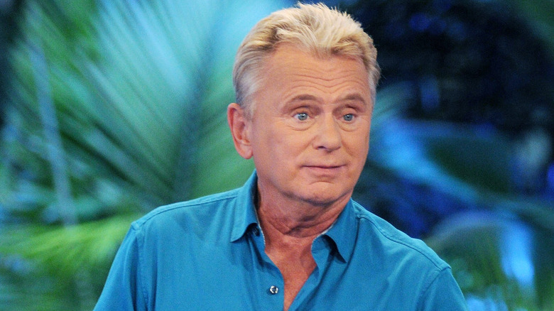 Pat Sajak looks left