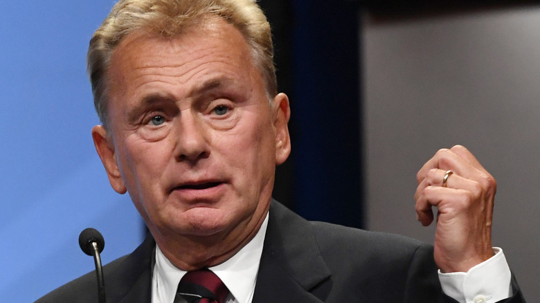 Pat Sajak raises his hand