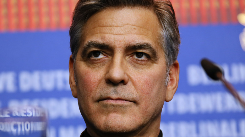 George Clooney close up face thoughtful expression