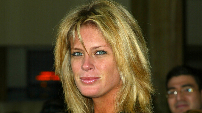 Rachel Hunter smiling with feathered hair