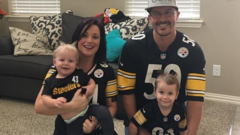 Chris, Shanann, Bella, and Celeste Watts in Steelers shirts