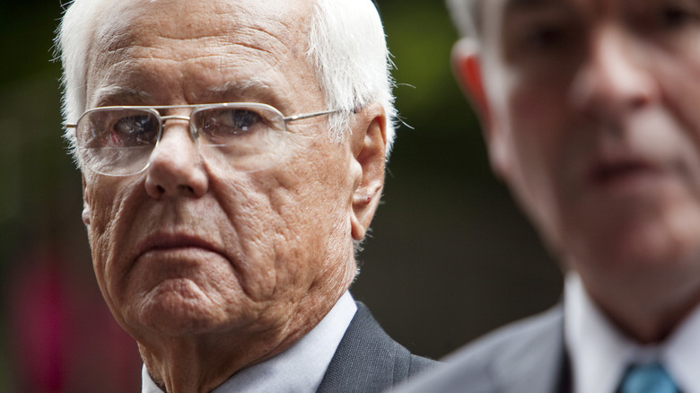 Nels Rasmussen outside court in suit