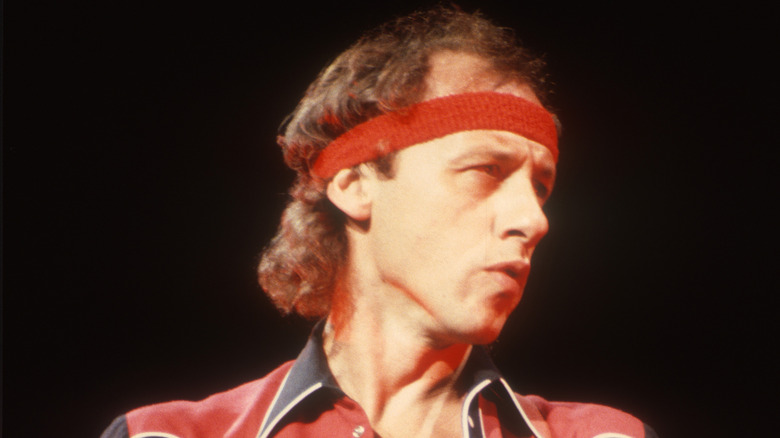 Mark Knopfler performing 