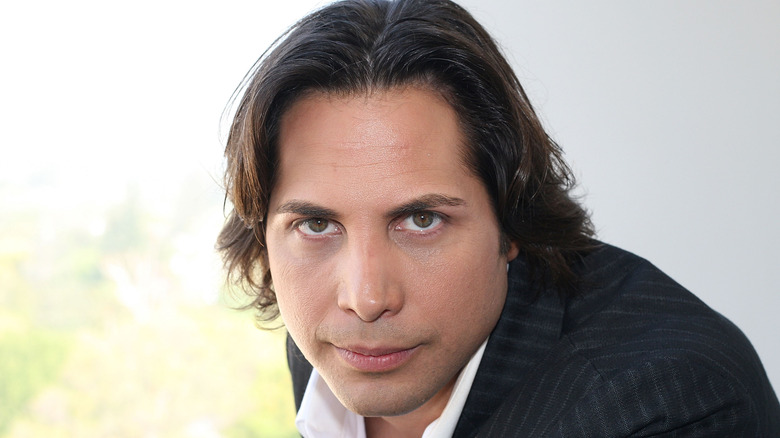 Joe Francis with long hair