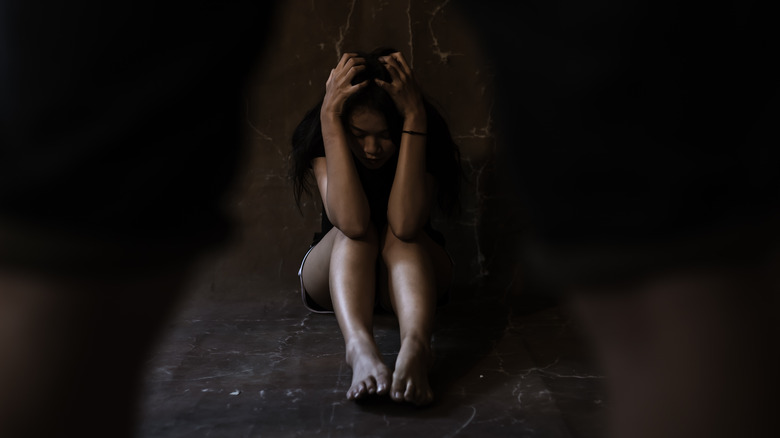 a woman who appears to be abducted