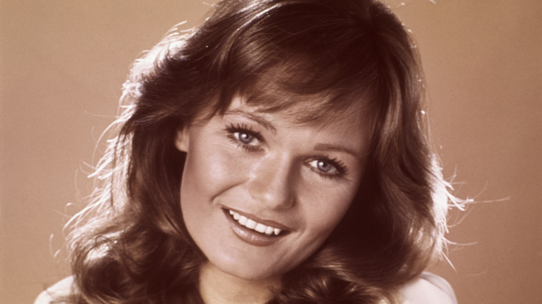 Valerie Perrine smiles