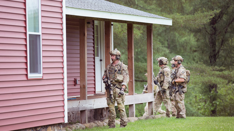 Armed FBI agents search property 