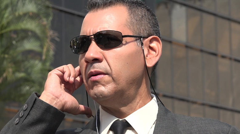 federal agent with an earpiece