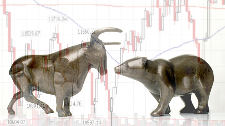 Bull vs. bear figurine fighting