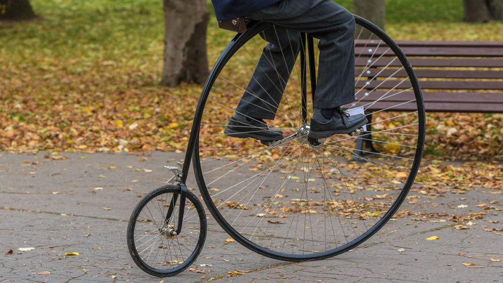 Man riding a penny farthing