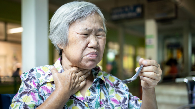 woman choking