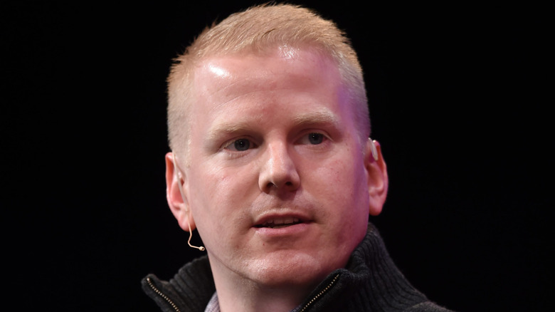 Kevin Collean looking to his left during panel talk