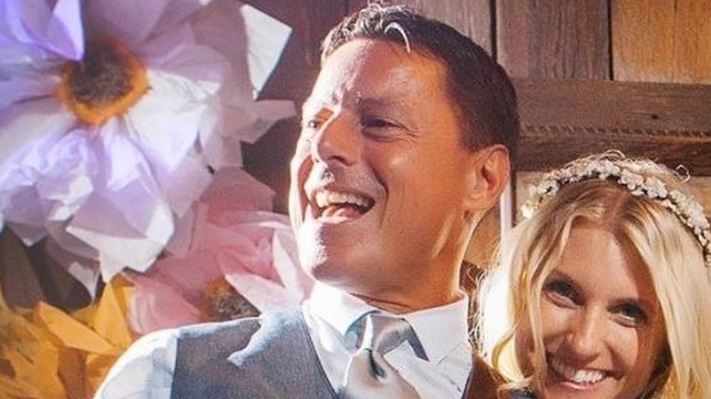 Chris Skarakis playing guitar at his wedding