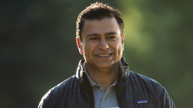 Omid Kordestani smiling during outdoor walk