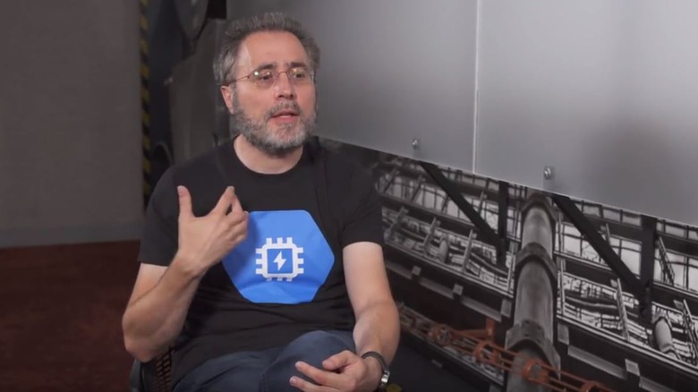 Urs Hölzle sat talking with beard and glasses