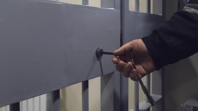 guard key lock jail cell door
