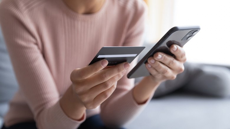 a woman and her credit card