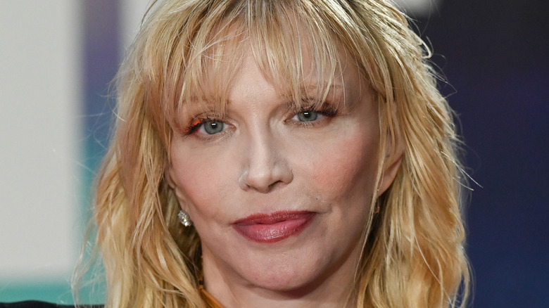 Courtney Love In red lip gloss